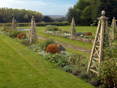 muddy boots landscaping grounds and garden maintenance